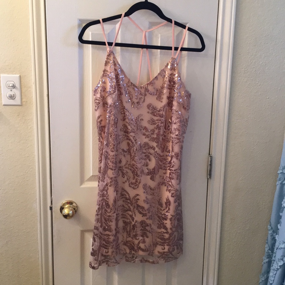 Fun light pink/peach colored sequins dress!